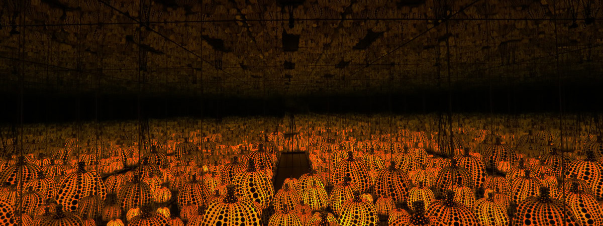 Infinity mirror room with pumpkins